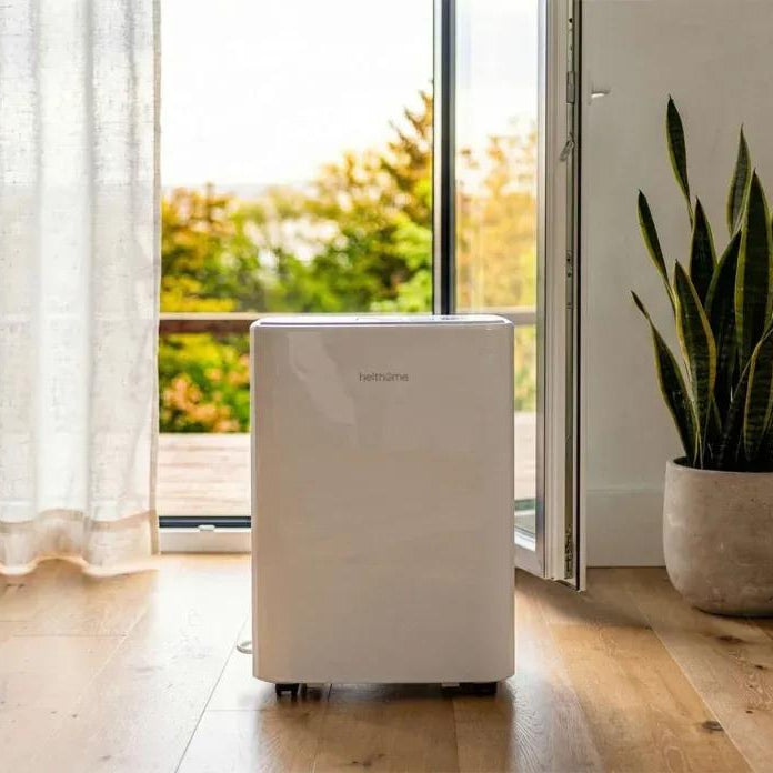 A helthome dehumidifier in a bright living room — an effective solution for managing indoor humidity and dampness
