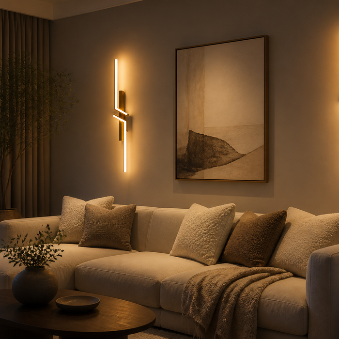Modern rechargeable LED wall sconce mounted in a stylish UK bedroom with warm ambient lighting
